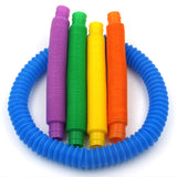 Motricité, tubes colorés pop